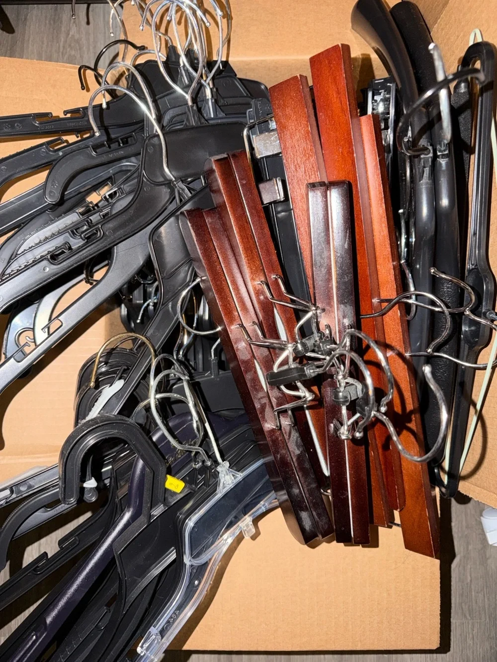5 lbs Mixed Black Plastic and Wood Clothing Hangers